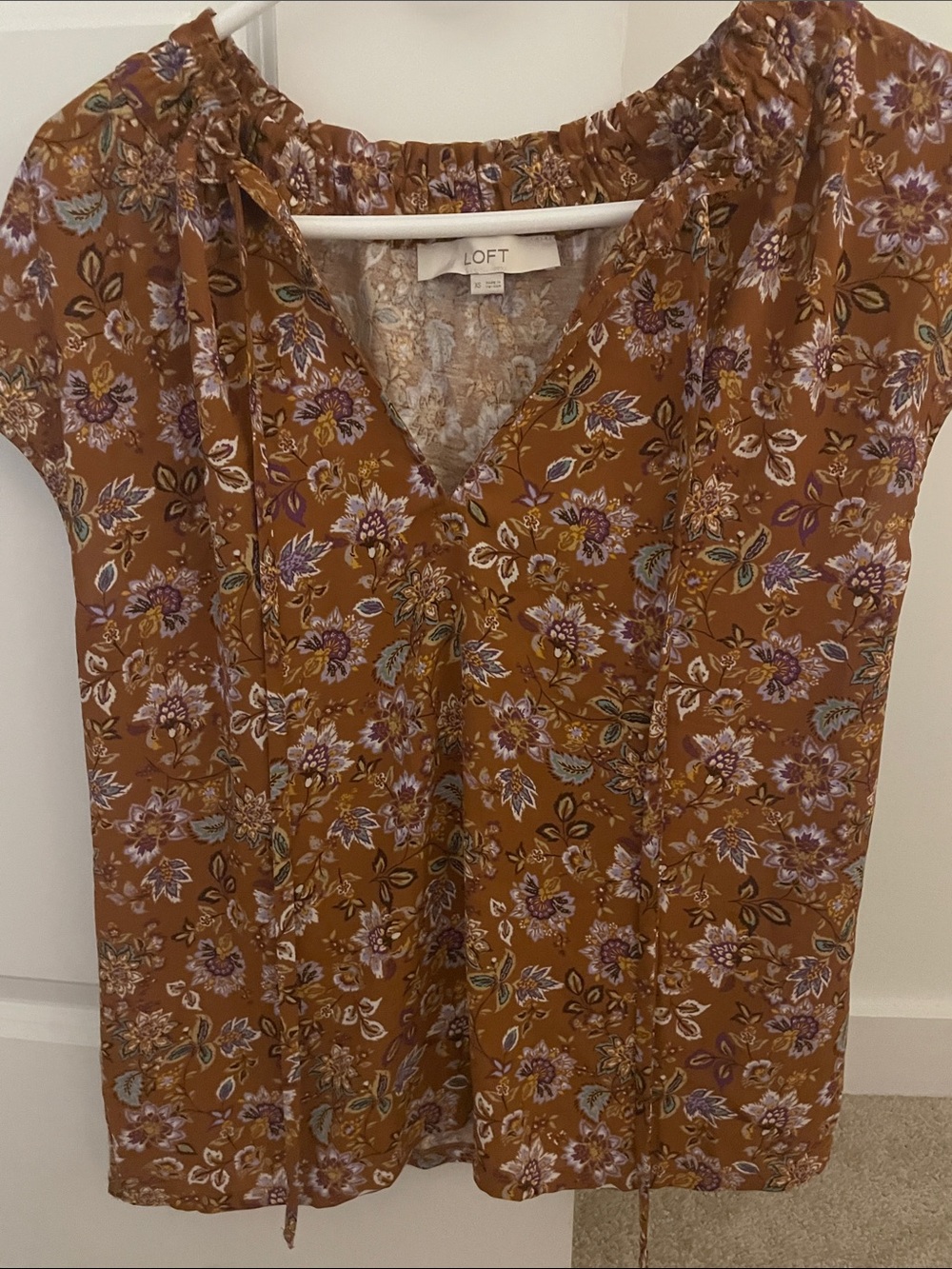 Women’s cap sleeve/short sleeve blouse with ties